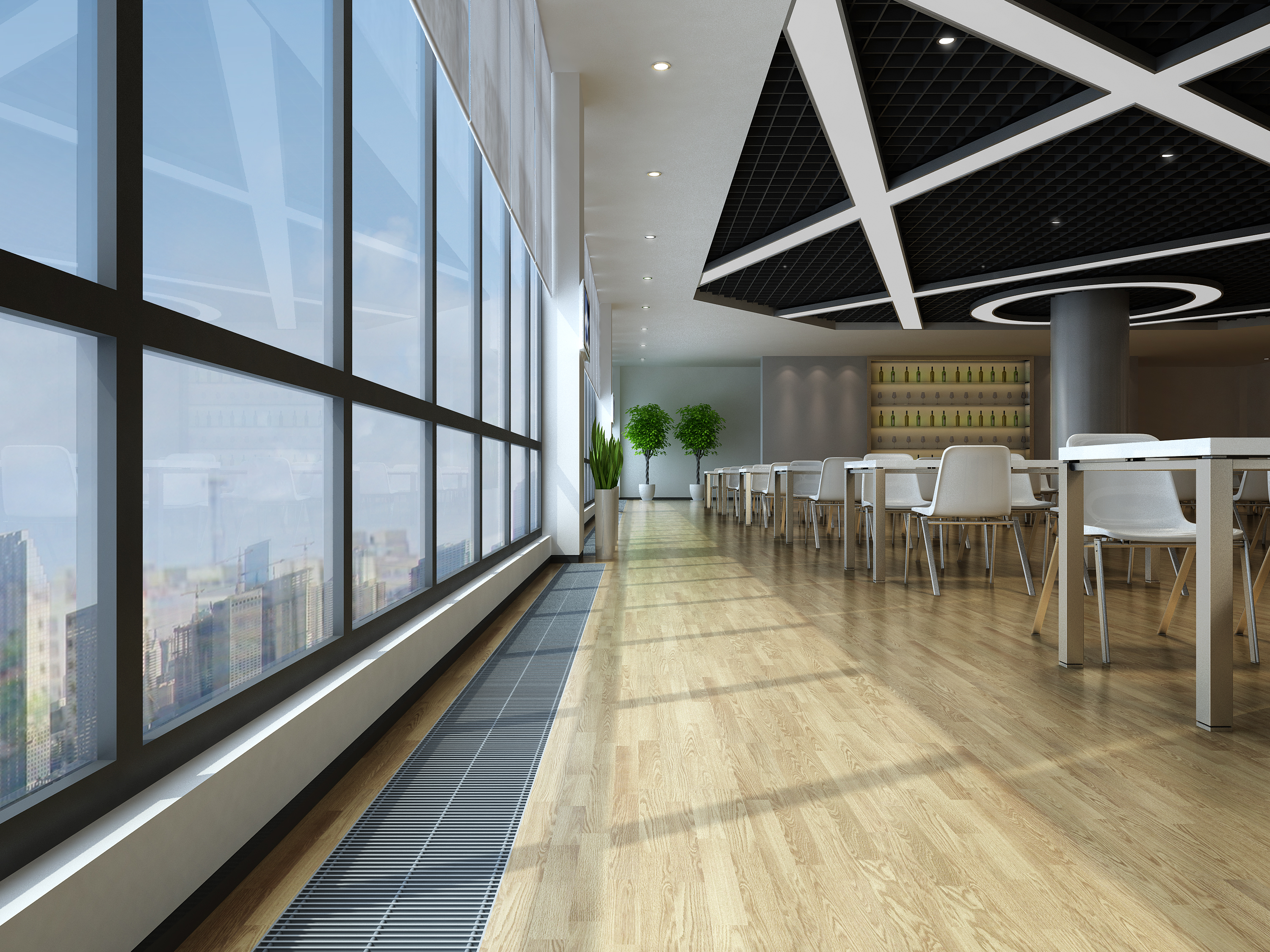 Floor convector installed alongside full-height windows in a dining space