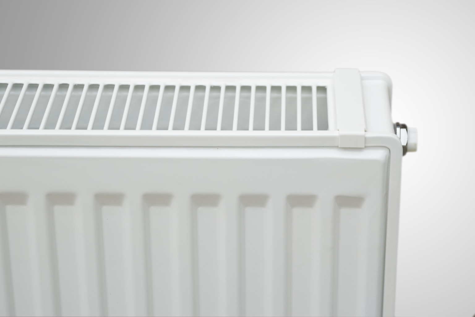 Steel panel radiator top cover and front panel connection detail